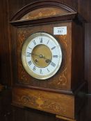 AN EDWARDIAN INLAID MAHOGANY MANTEL CLOCK MARKED R&C