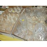 TWO TRAYS OF ASSORTED CUT GLASS TO INCLUDE STUART CRYSTAL CHAMPAGNE FLUTES, BOWLS ETC
