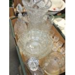 A TRAY OF MOSTLY CUT GLASSWARE TO INCLUDE A LARGE VASE, WHITE METAL COLLARED DECANTER, DRINKING