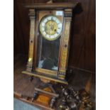 A VINTAGE MAHOGANY VIENNA WALL CLOCK WITH FLORAL PAINTED DETAIL