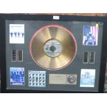 A FRAMED AND GLAZED THE BEATLES LIMITED PRESENTATION GOLD DISC - NUMBER 10/250