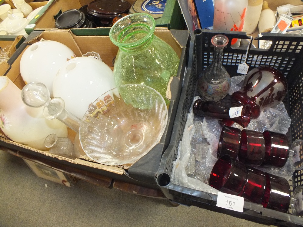 TWO TRAYS OF ASSORTED GLASSWARE TO INCLUDE TWO ANTIQUE ETCHED GLASS DECANTERS, RED GLASS DECANTER