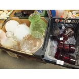 TWO TRAYS OF ASSORTED GLASSWARE TO INCLUDE TWO ANTIQUE ETCHED GLASS DECANTERS, RED GLASS DECANTER