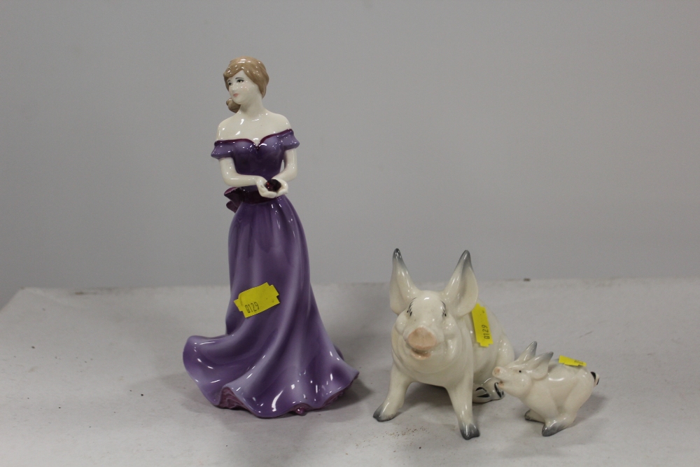 A ROYAL WORCESTER BIRTH STONE PISCES AND TWO BESWICK PIG FIGURES