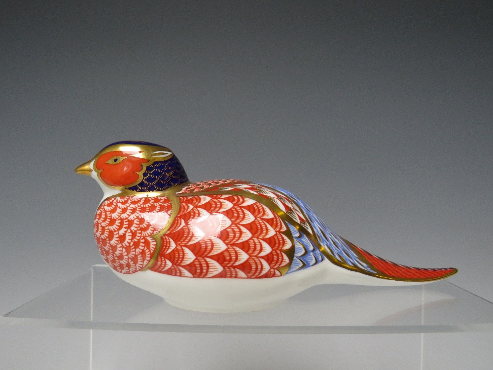 A ROYAL CROWN DERBY PHEASANT PAPERWEIGHT, with gold stopper, L 18 cm