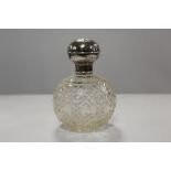 A LARGE HALLMARKED SILVER TOPPED SCENT BOTTLE - CHESTER 1910