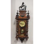 A 19TH CENTURY VIENNA WALLCLOCK WITH HORSE FINIAL, overall H 99 cm, W 30 cm