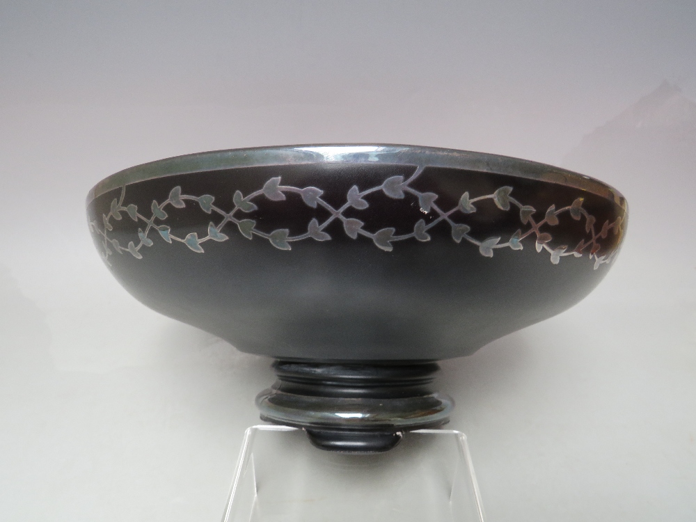 AN EARLY TO MID 20TH CENTURY FOOTED BLACK GLASS BOWL WITH WHITE METAL INLAY, of circular form with - Image 6 of 9