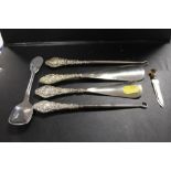 A COLLECTION OF SILVER HANDLED SHOE HORNS AND BUTTON HOOKS ETC (6)