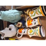 A QUANTITY OF WADE CLARICE CLIFF STYLE JUGS AND OTHER WADE CERAMICS TO INCLUDE GLUG JUGS