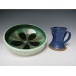 A VINTAGE POOLE POTTERY BOWL, H 9 cm, Dia. 27 cm, together with a blue studio pottery jug by NICK