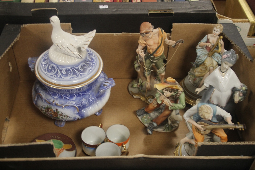 A TRAY OF CERAMICS TO INCLUDE CONTINENTAL FIGURES AND A LIDDED POT WITH WHITE DOVE FINIAL (TRAYS NOT