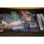 A LARGE QUANTITY OF ASSORTED JIGSAWS