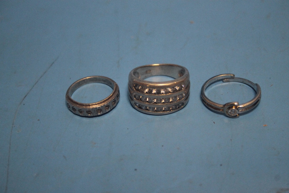 THREE RINGS MARKED .925, .835 AND 9 CT GOLD AND SILVER