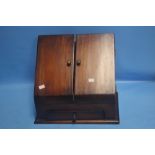 A WOODEN TWO DOOR LETTER RACK / STATIONARY CABINET WITH DRAWER