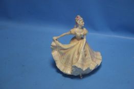 A ROYAL DOULTON FIGURINE "NINETTE"