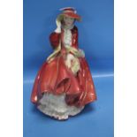 A ROYAL DOULTON FIGURINE 'TOP O' THE HILL'