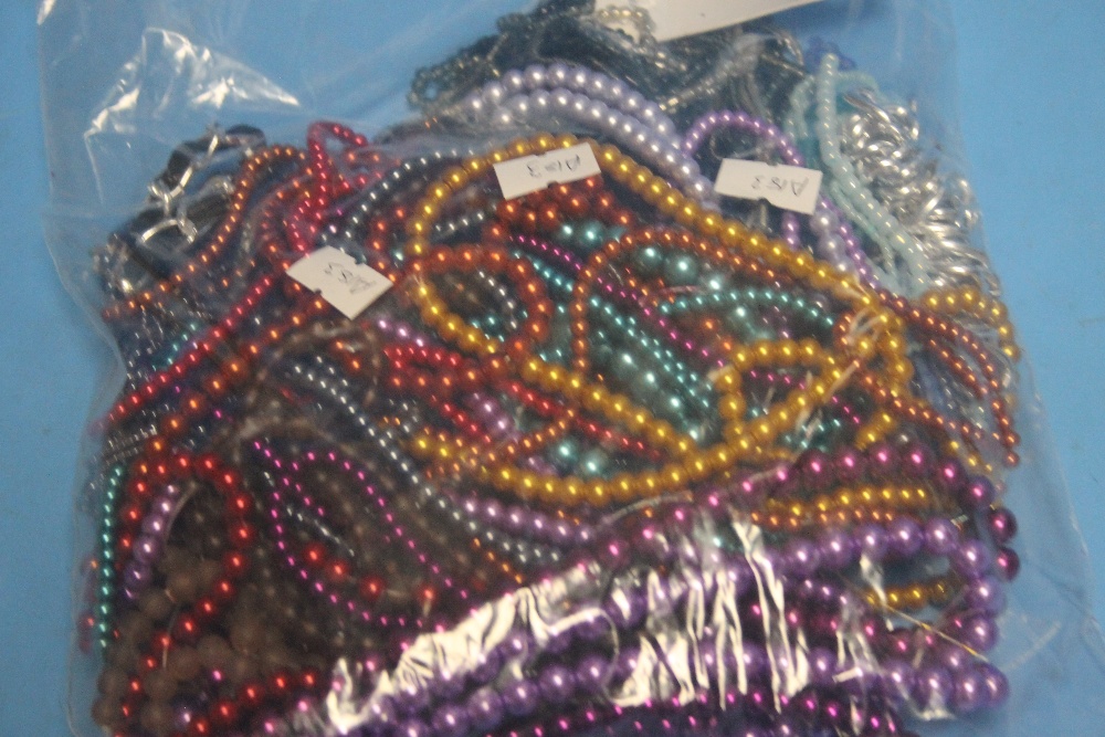A BAG OF COLOURED BEAD NECKLACES - Image 2 of 2