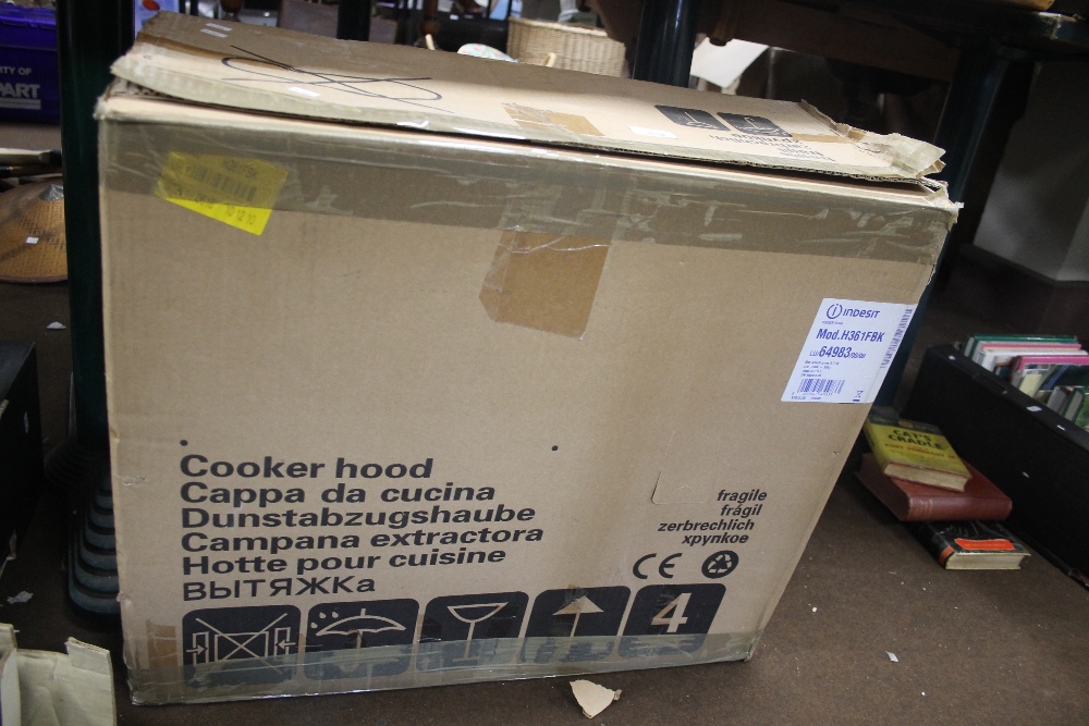 A BOXED INDESIT COOKER HOOD