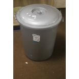 A PLASTIC DUSTBIN WITH LOCKABLE LID