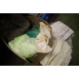 A BOX OF FABRIC, SHEETS ETC