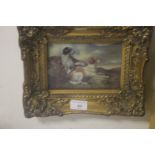 A FRAMED AND GLAZED REPRODUCTION LITHOGRAPH OF DOGS 28 CM X 22 CM