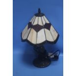 A SMALL TIFFANY STYLE LAMP