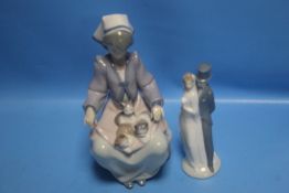 A LLADRO FIGURINE OF A LADY WITH KITTENS TOGETHER WITH A NAO FIGURE GROUP BRIDE & GROOM