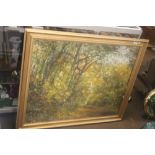 AN OIL PAINTING ON CANVAS OF A FOREST SCENE SIGNED BY C SIMMONDS 104 CM 84 CM