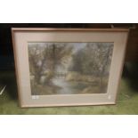 A FRAMED AND GLAZED WITH WATERCOLOUR OF A RIVER SCENE