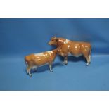 A BESWICK BULL AND COW BOTH A/F