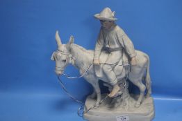 A ROYAL DUX FIGURE OF A BOY ON A HORSE