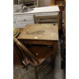 A SMALL VINTAGE CHILDS DESK WITH TWO CHAIRS