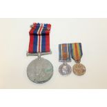 A PAIR OF MINIATURE WWI MEDALS TOGETHER WITH A WWII MEDAL