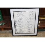A FRAMED AND GLAZED SIGNED PAIR OF STABLESOFT JOCKEY BREACHES WITH NUMEROUS SIGNATURES INCLUDING A P