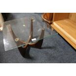 A RETRO TEAK GLASS TOP OCCASIONAL TABLE