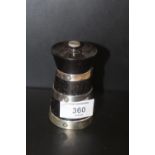 AN EBONY AND SILVER PLATED PEPPER GRINDER BY HUKIN AND HEATH S/D