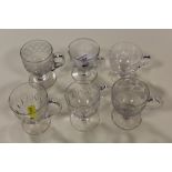 A COLLECTION OF SIX ANTIQUE GLASS CUSTARD CUPS