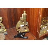 A VINTAGE BRASS MICROSCOPE BY BECK LTD OF LONDON MODEL 29