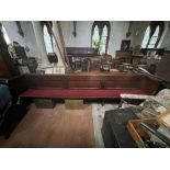 A LARGE VICTORIAN STAINED PINE CHURCH PEW, CIRCA 1850-70, APPROX 10FT WIDE