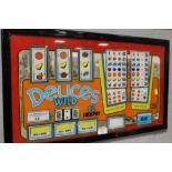 A FRAMED 'DEUCES WILD' PANEL FROM A FRUIT MACHINE