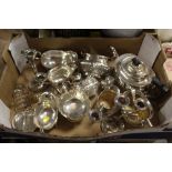 A TRAY OF SILVER PLATED METALWARE ETC. TO INCLUDE A TEA SERVICE, SAUCE BOATS ETC.