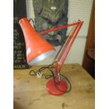 A VINTAGE HERBERT TERRY AND SONS RED ENAMEL ANGLE POISE LAMP