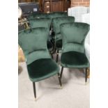 A SET OF SIX MODERN GREEN VELVET DINING CHAIRS