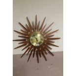 A RETRO TEAK ANSTEY & WILSON SUNBURST WALLCLOCK - DIA 64 CM