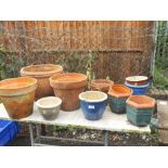 A COLLECTION OF TERRACOTTA AND BLUE GLAZED PLANT POTS (11)