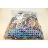 A BAG OF ASSORTED COSTUME JEWELLERY