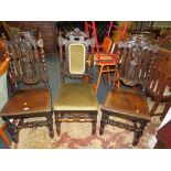 A PAIR F JACOBEAN STYLE CARVED OAK DINING CHAIRS AND A SIMILAR UPHOLSTERED CHAIR (3)