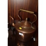 A LARGE VINTAGE COPPER KETTLE