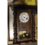 A VINTAGE MAHOGANY WALL CLOCK A/F, TOGETHER WITH AN EMBROIDERED OAK SERVING TRAY (2)